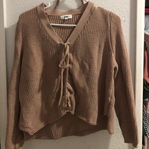 Knit sweater with tie up details